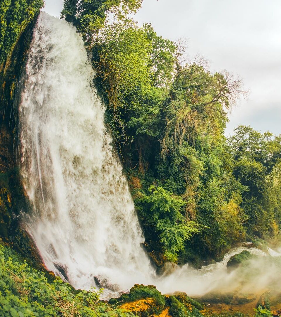 Famous Keranos waterfall drops 70m among plane trees that were seeded centuries hence