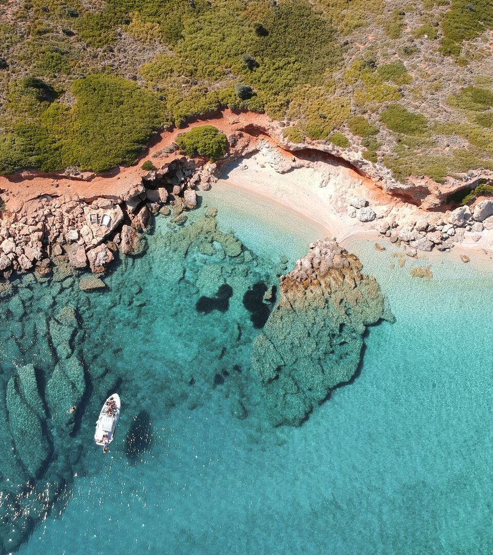 The southern part of the island is embroidered with beaches, charming bays and green-blue water