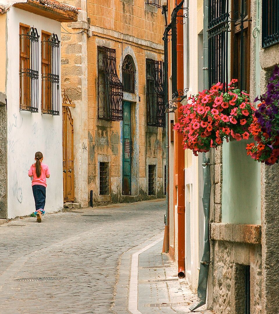 Xanthi's Old Town, multi-coloured homes have painted walls, wooden windows and blossom-filled  gardens