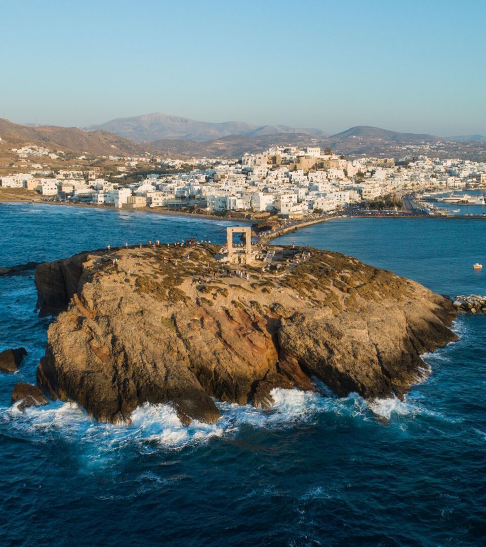 View of Naxos Hora from the little island on which Portara stands, Palatia, is now connected to the mainland