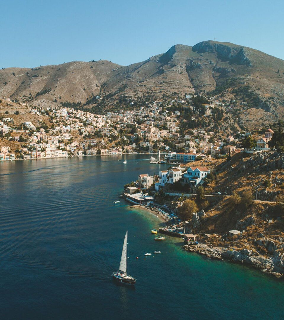 Arriving at Gialos, Symi’s main port imprints itself into your memory like a photograph.