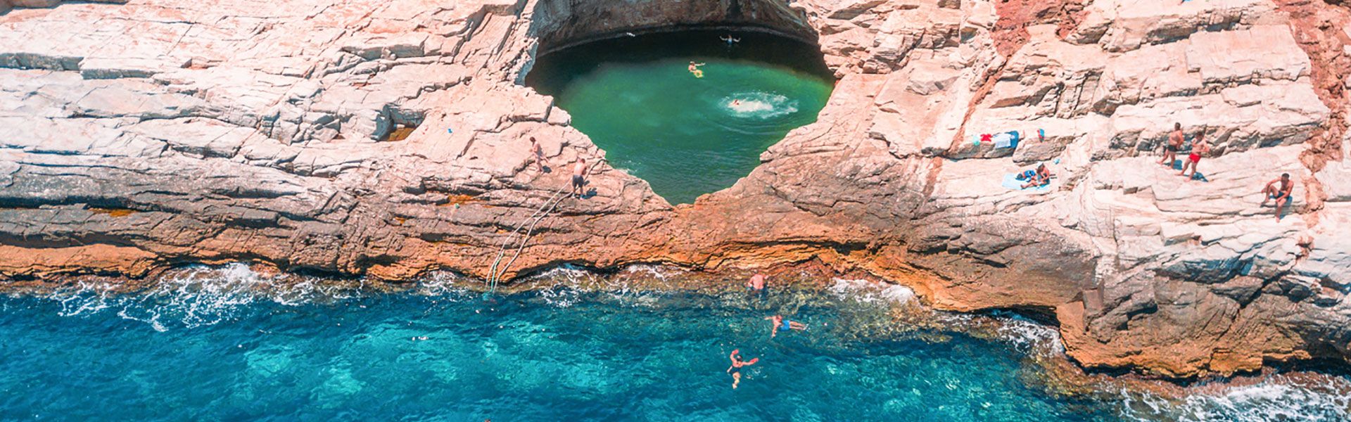 Giola lagoon the natural pool carved into the rock by the sea in Thassos