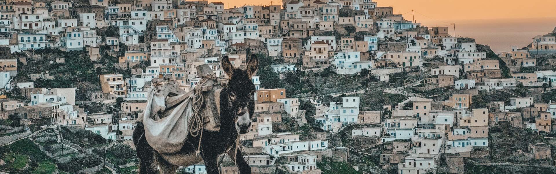 Olympos settlement retains medieval architecture and proved breathtaking panoramic views of the Aegean sea