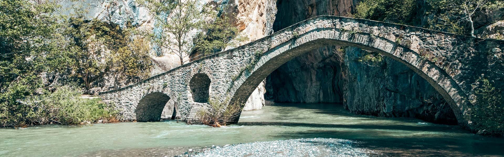 Portitsa gorge and the old stone bridge of Venedictos river near Grevena city