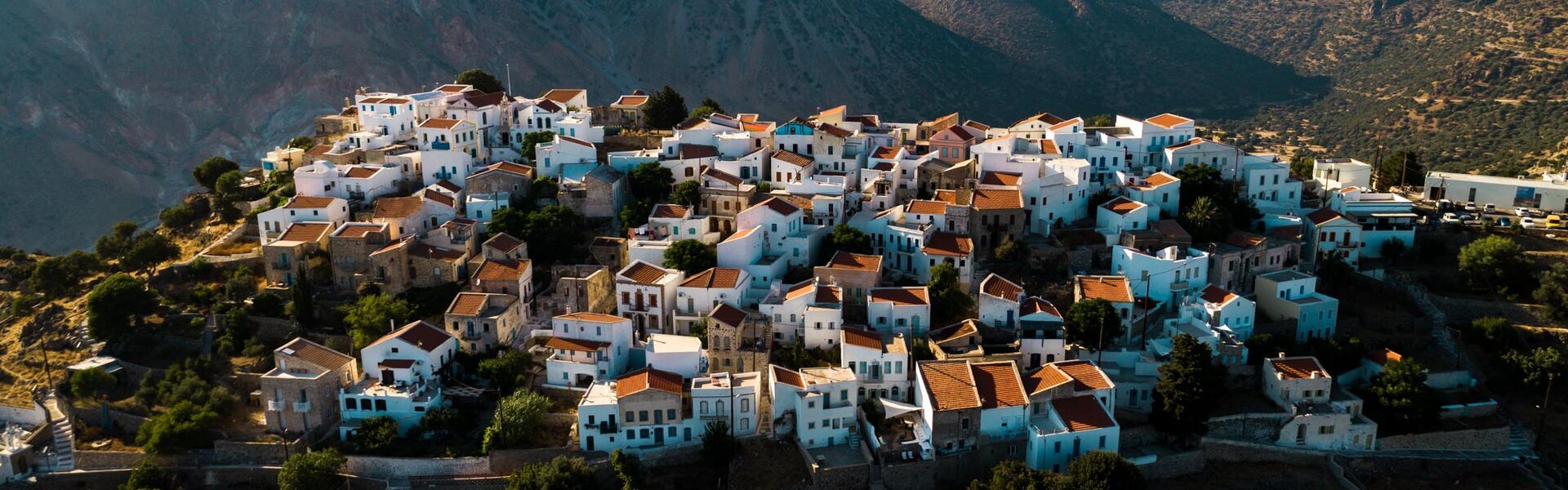 Enjoy your coffee in Nikaias village square or admire the amazing caldera views