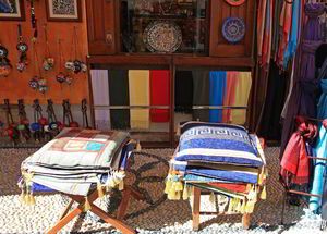 Traditional shops and merchandise on the streets of Lindos in Rhodes