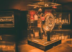 The immense armour of King Philip II, displayed in evocatively dimmed light