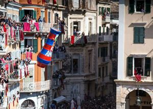 Painted pots (botides) are dropped from balconies during Easter festivities in Corfu