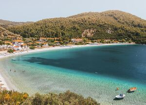 In a setting of tranquil green and blue, Panormos is one of the most welcoming beaches in Skopelos