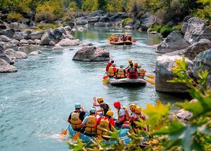 You pass along a deep gorge full of nature, admiring extraordinary-coloured water and plane trees