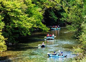 Adventure teams doing rafting on the cold waters of the Voidomatis 