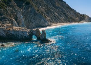 Lalaria, up on the north coast of Skiathos is unique for its smooth, pearly-white pebbles and dramatic cliff setting