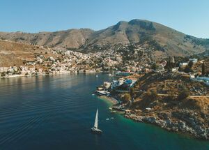 Arriving at Gialos, Symi’s main port imprints itself into your memory like a photograph.
