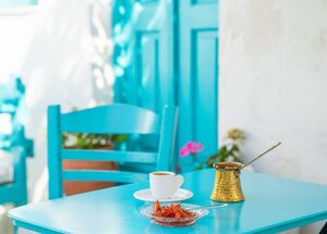 Legend says that when you have an afternoon coffee in a beautiful island square in the Cyclades, time stops.