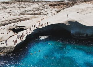 Dive from the limestone-white rocks of Sarakiniko