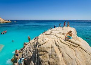 Admiring the view from Seychelles beach in Ikaria