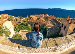 Maria gazing the sea from Monemvasia's most instagrammable spot