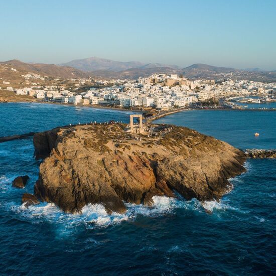 View of Naxos Hora from the little island on which Portara stands, Palatia, is now connected to the mainland