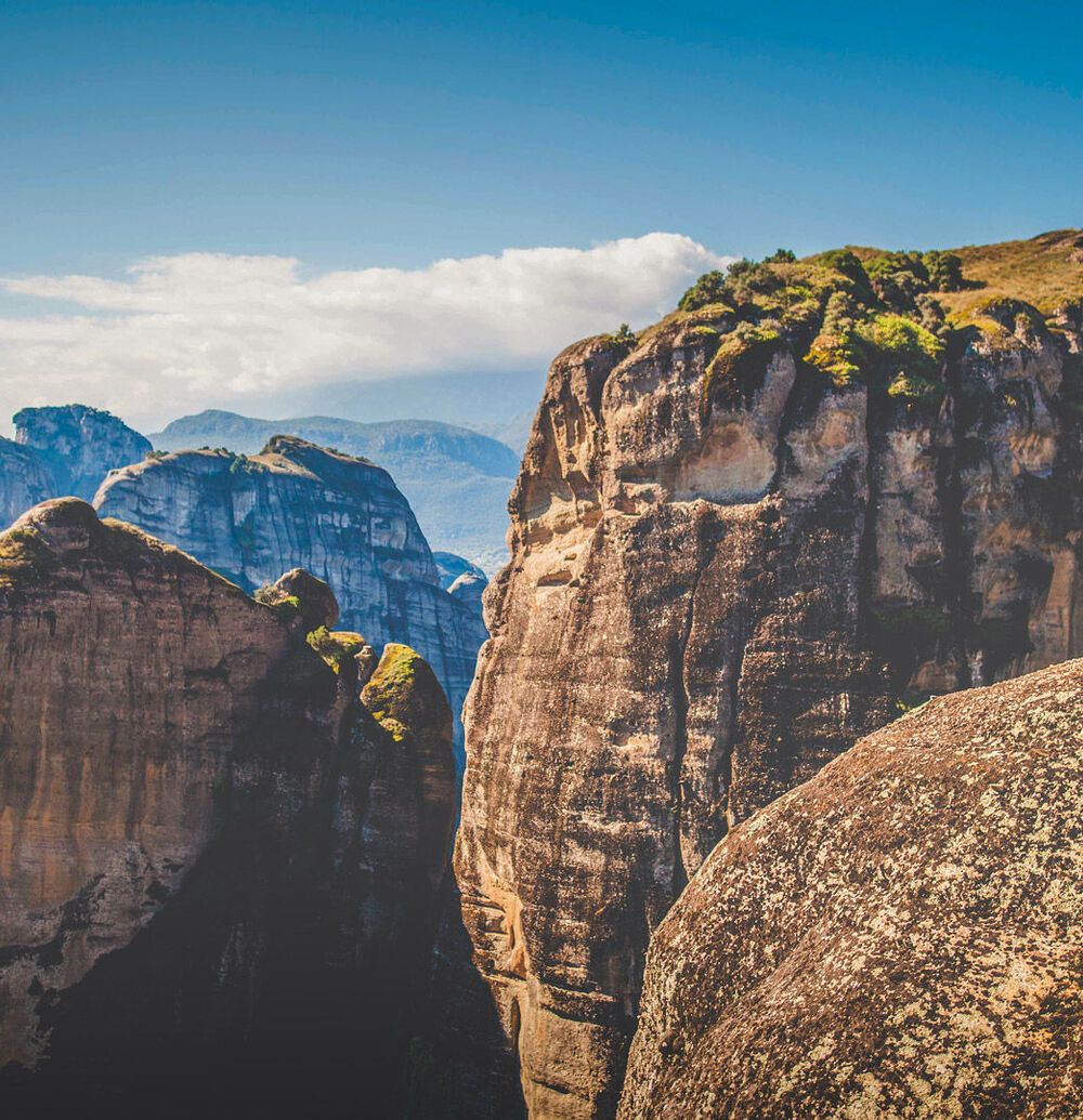 Walk among the gigantic rock pillars of Meteora to enjoy truly breathtaking views