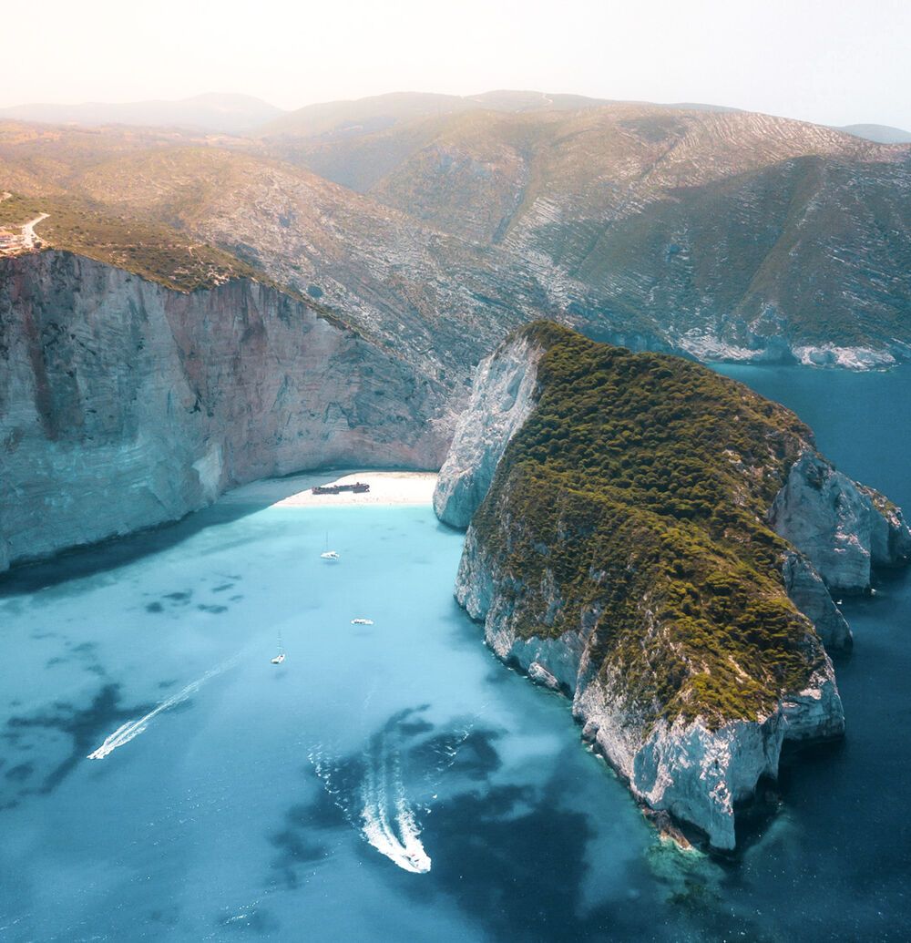 Beautiful sunny coast view to greek beach mediterranean blue sea