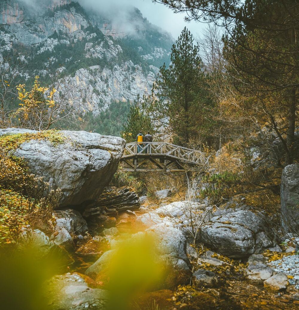 Wooden bridges criss-cross the 10km Epineas path along the densely-forested valley