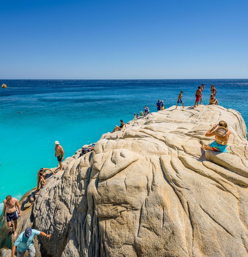 Admiring the view from Seychelles beach in Ikaria