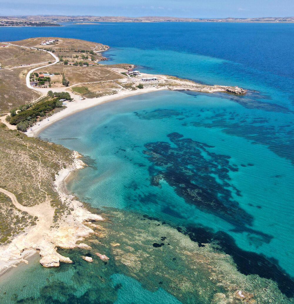 Fine white sand and shallow water greet you at Fanaraki beach in Lemnos