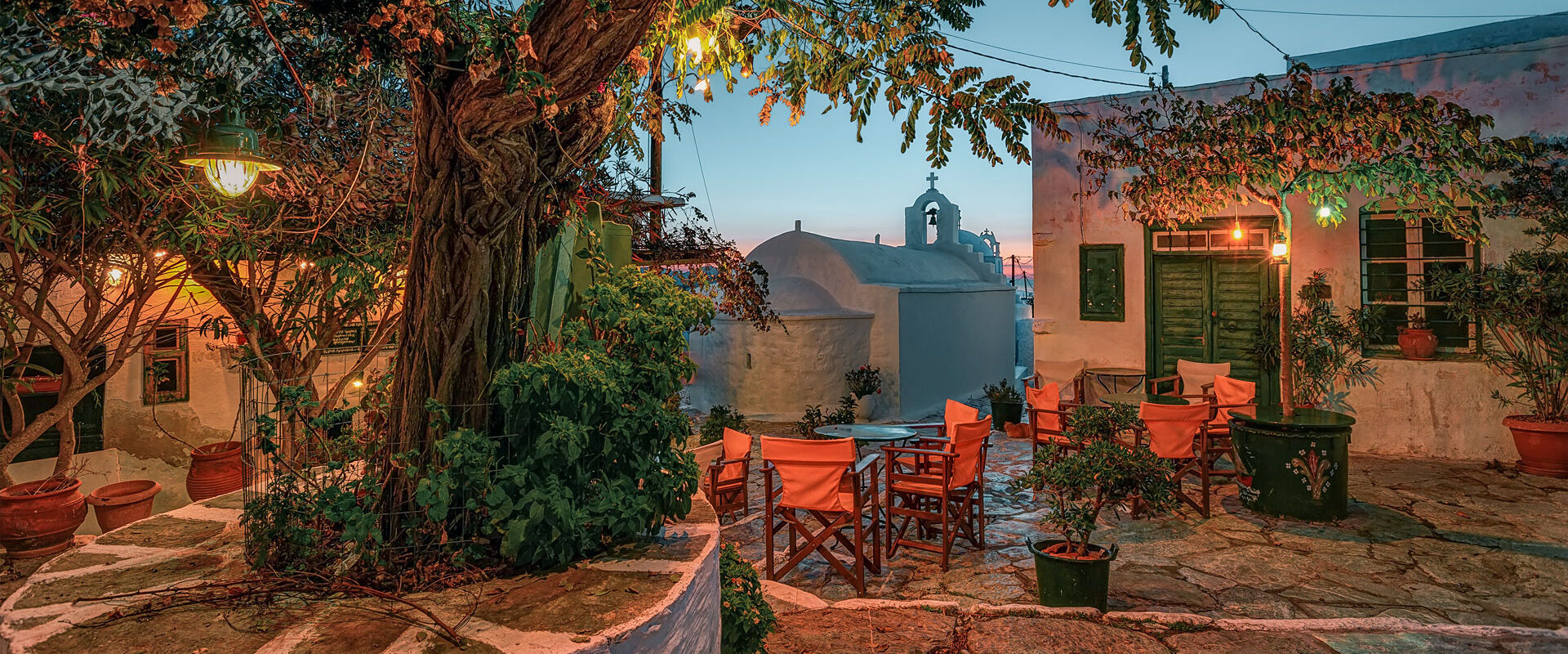 Small traditional paved square at dusk, Hora Amorgos