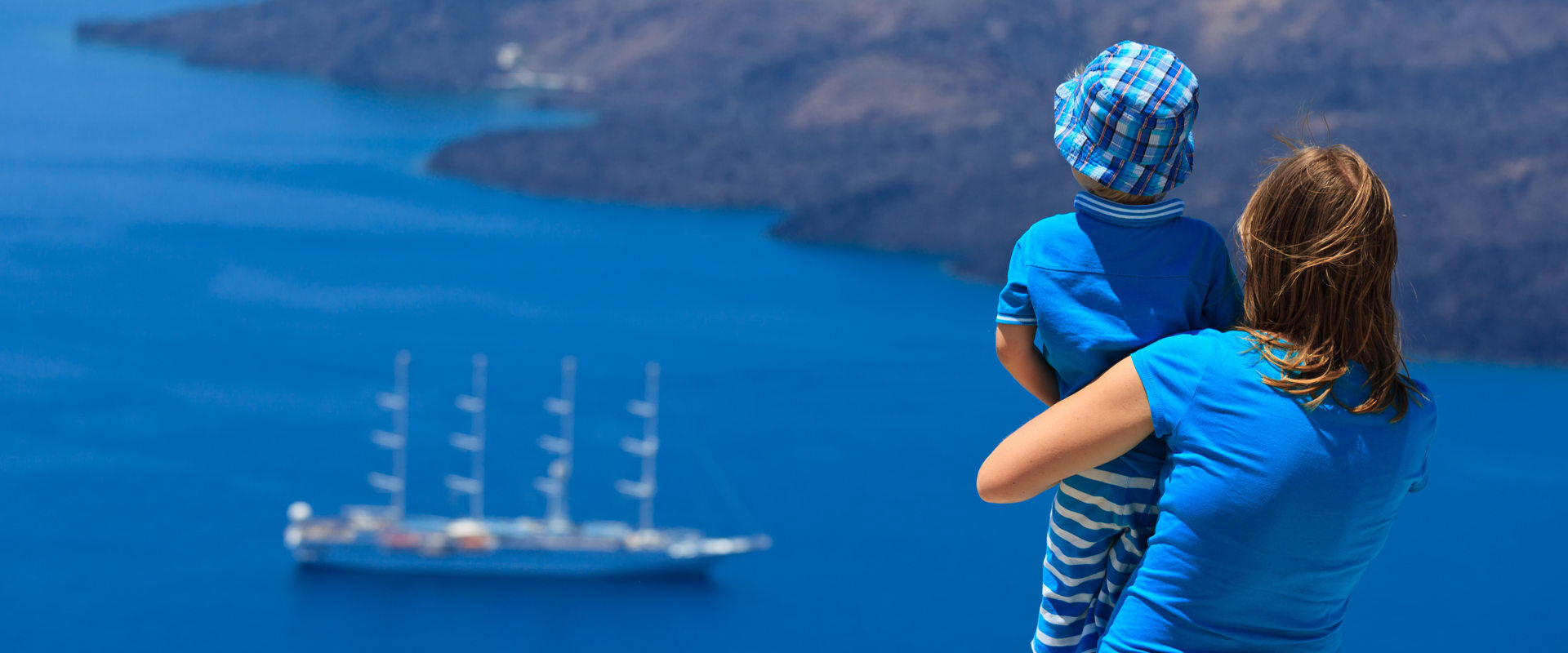 Family looking at Santorini