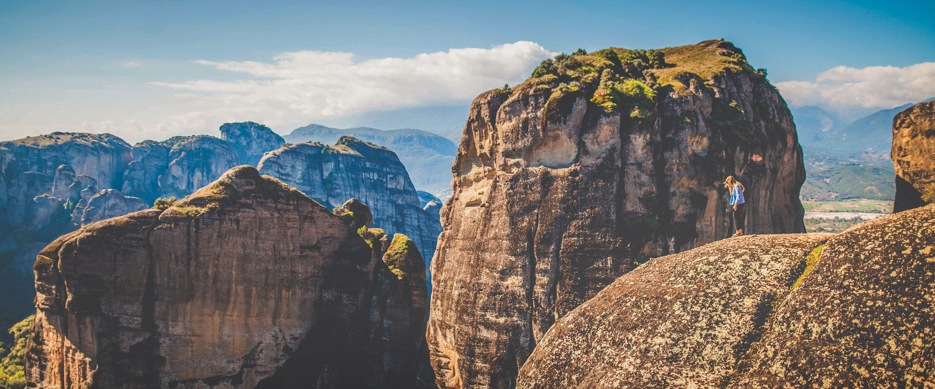 Walk among the gigantic rock pillars of Meteora to enjoy truly breathtaking views