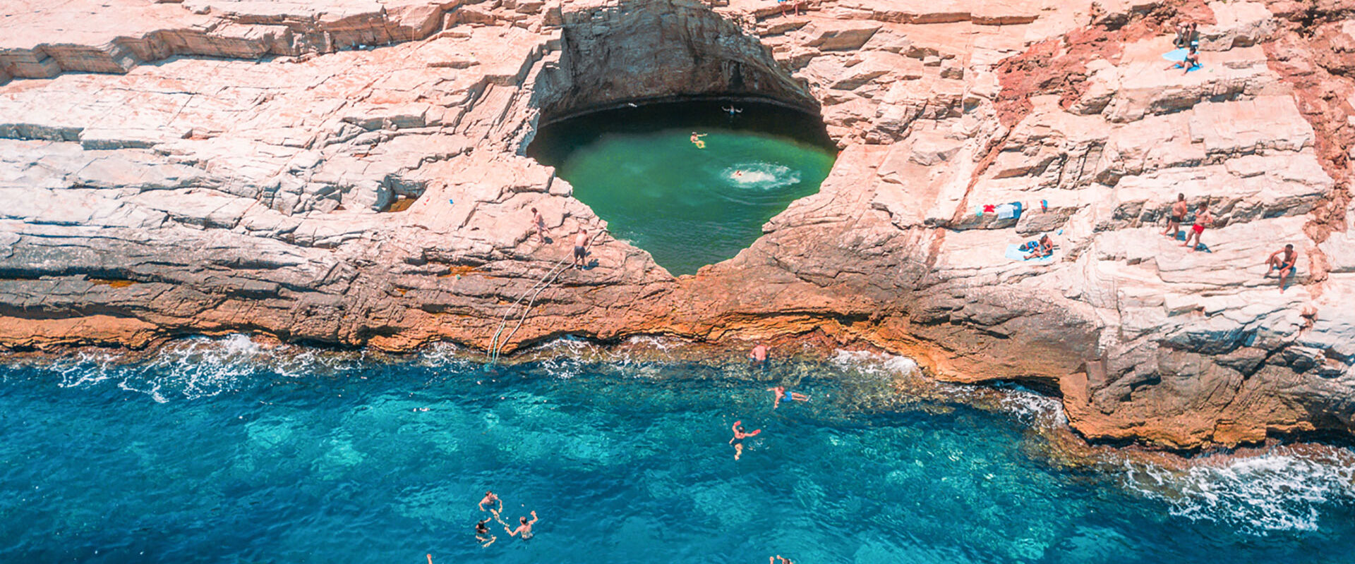 Giola lagoon the natural pool carved into the rock by the sea in Thassos