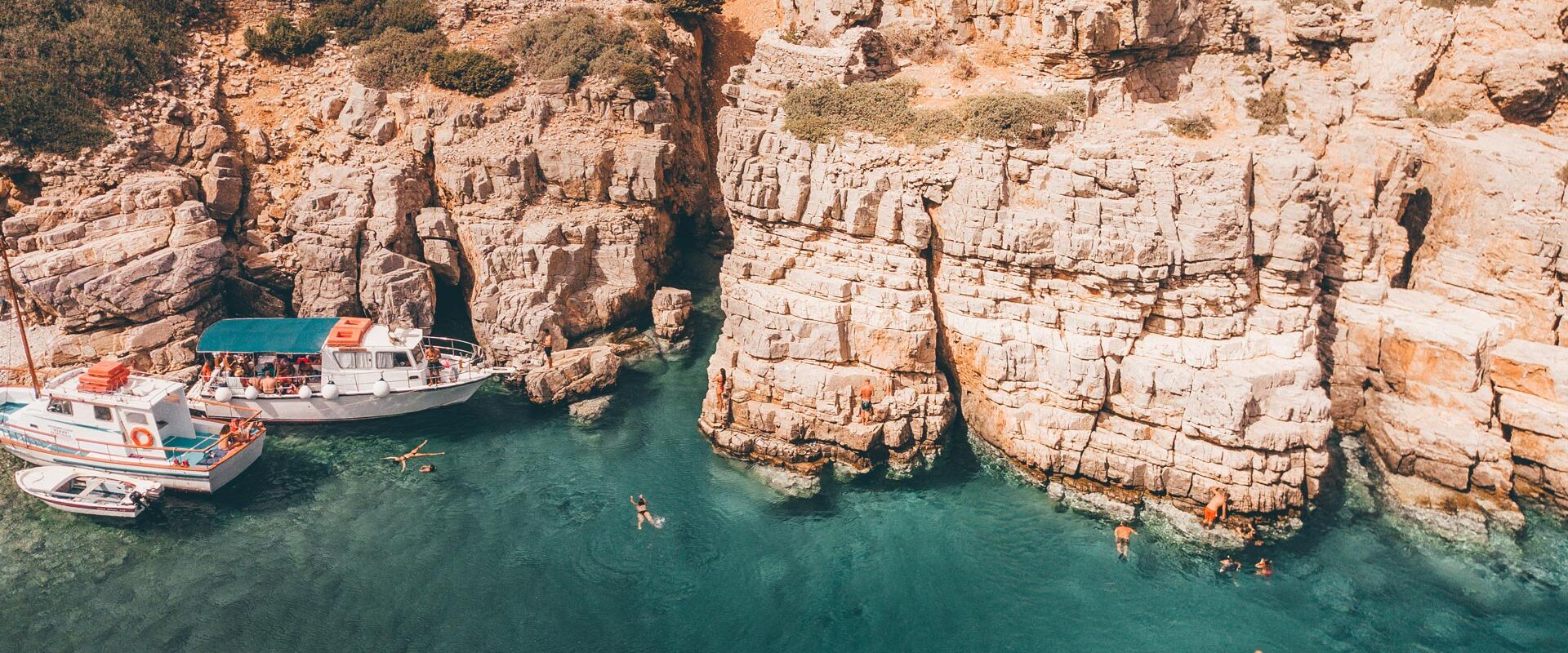 Boat trips to the island of Saria, an island of wild beauty, listed as a Natura 2000 area