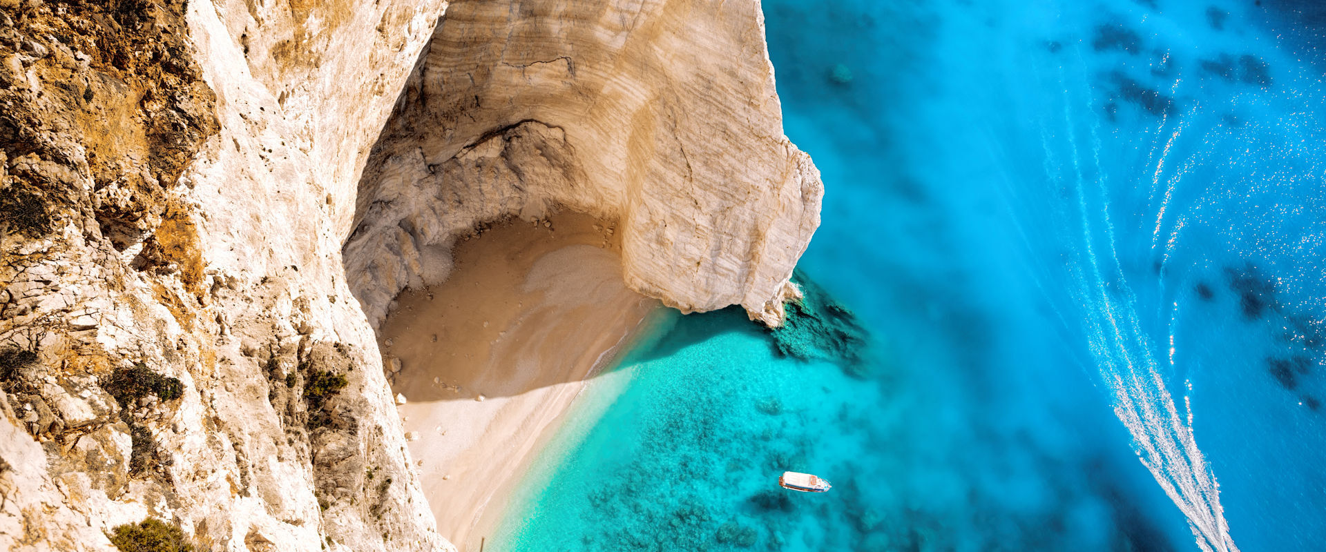 High cliff with boats on Zakynthos island