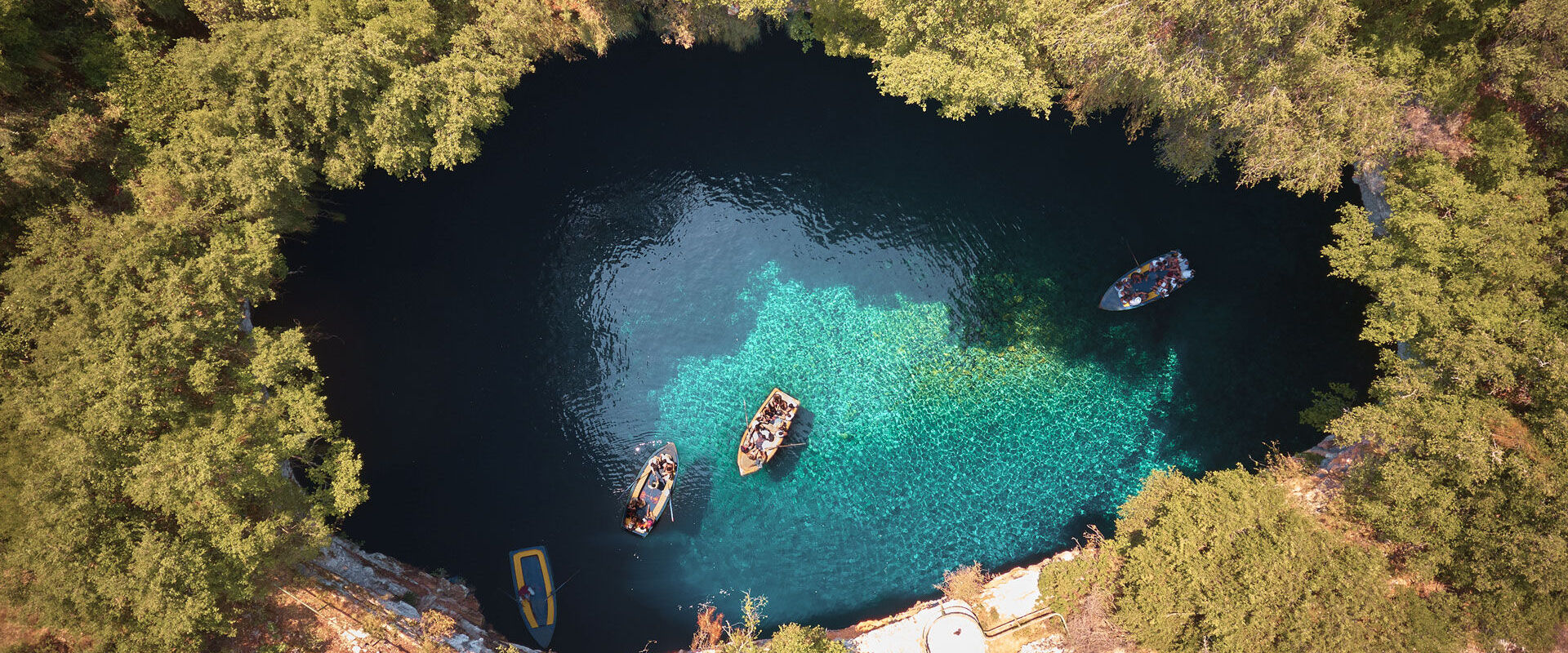 Through a 36m tall opening, the shafts of daylight that come streaming in from above bounce off the water and light up the chamber with ethereal blues