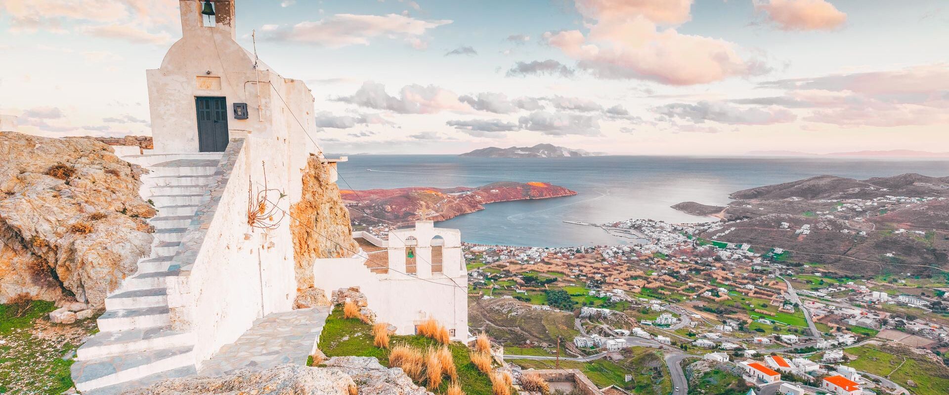 From the beautiful chapel of Agios Konstantinos nearby, you can look out beyond Livadi onto a who’s who of Cycladic islands