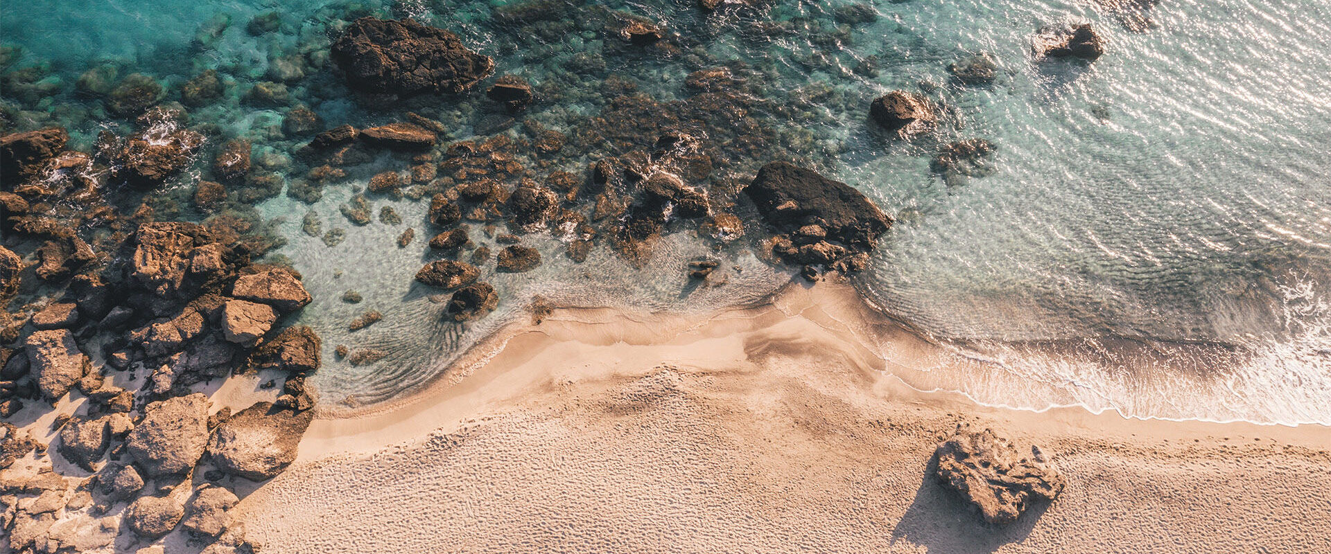 The sand extends for some distance along the mainland coastline and Elafonisi itself is about a mile long