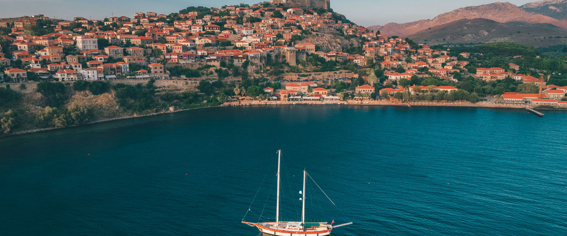 Sailing around Molyvos, a castle town overwatching the Aegean Sea