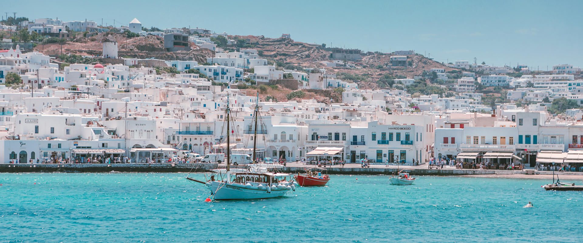 The Instagrammable beauty of Mykonos’ main town beats a strong, authentic heart that you’ll adore discovering