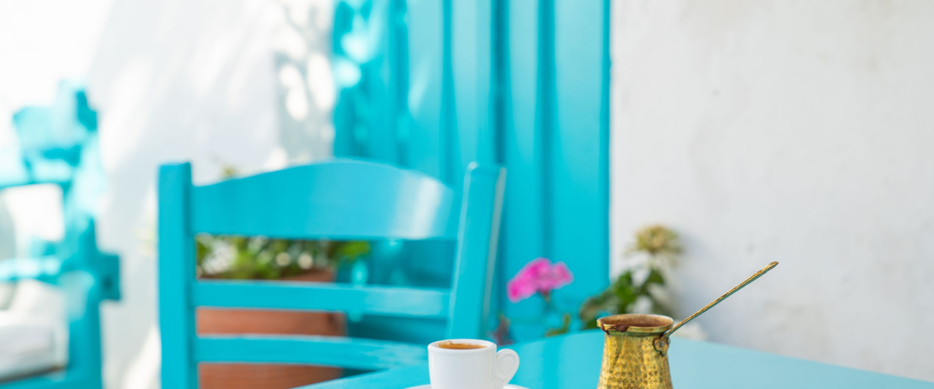 Legend says that when you have an afternoon coffee in a beautiful island square in the Cyclades, time stops.