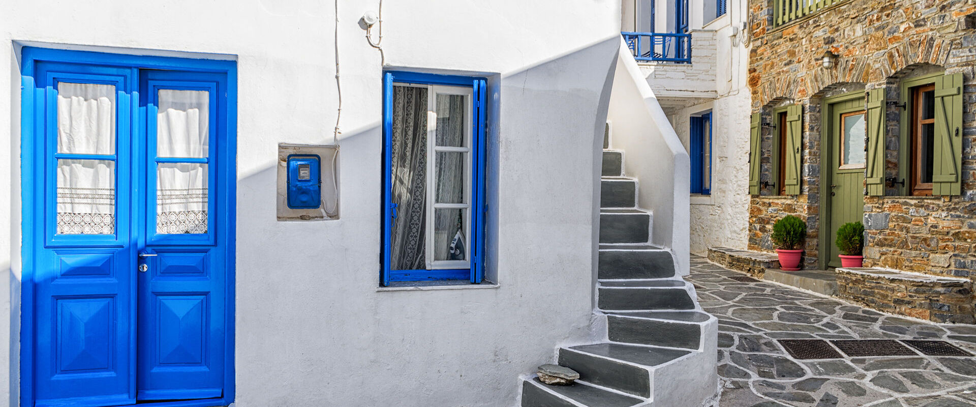 With its intense Cycladic colours and authentic island atmosphere, it charms every visitor