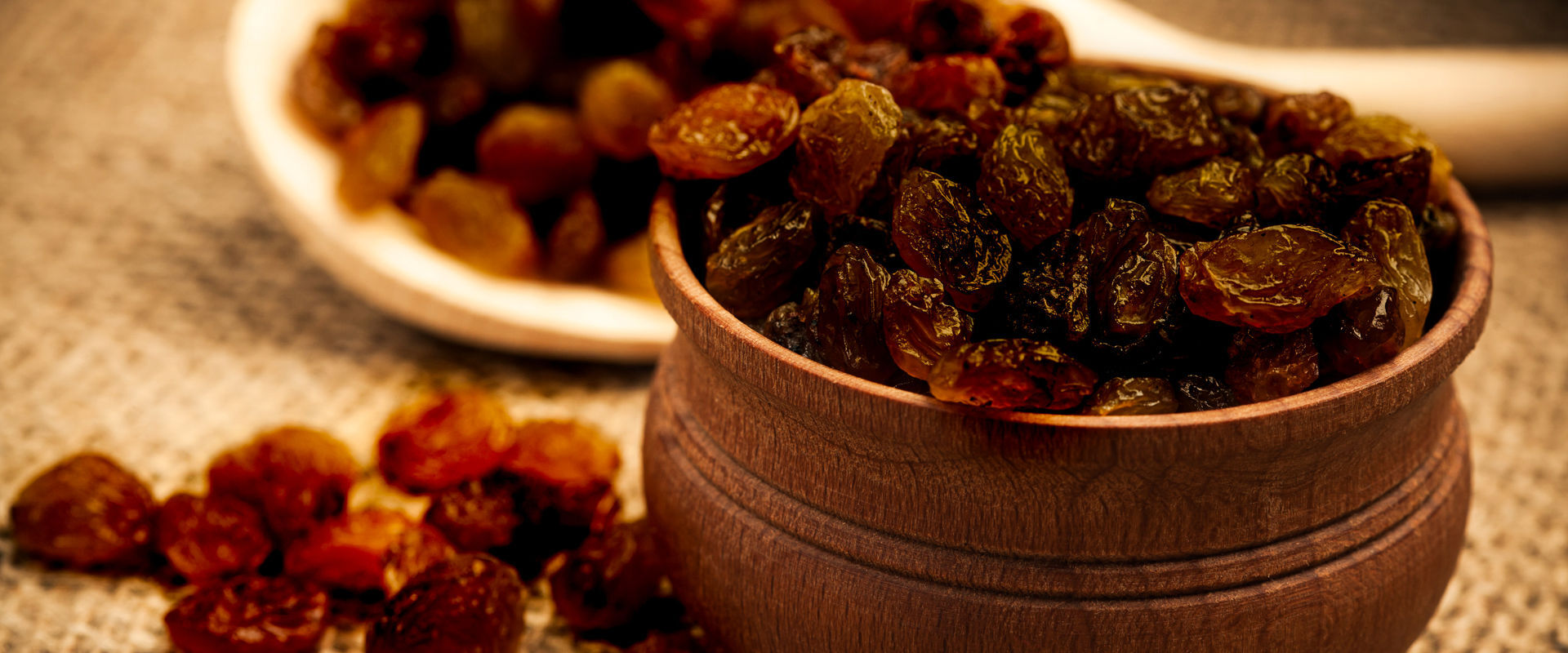 In August, you’ll see the Corinthian raisins drying on the threshing floors