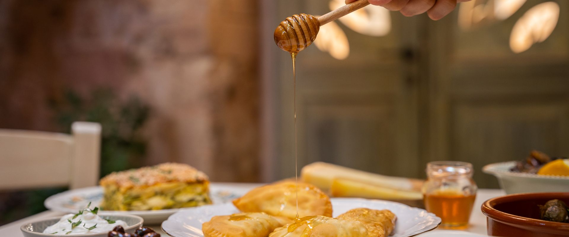 Kalitsounia are small cheese pies, also with myzithra. Honey can be drizzled on before serving for an extra sweet touch
