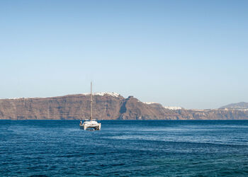 A caldera boat tour in Santorini