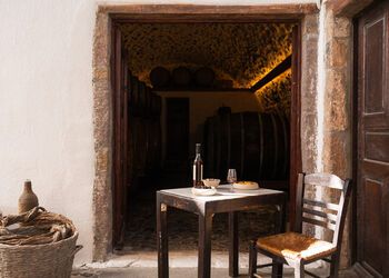 Enjoy a vineyard and wine tour of Santorini