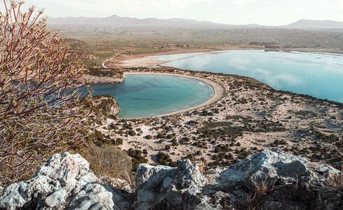 Voidokilia, the majesty of nature quite like the iconic horseshoe-shaped beach and its accompanying saltwater lagoon in Messinia