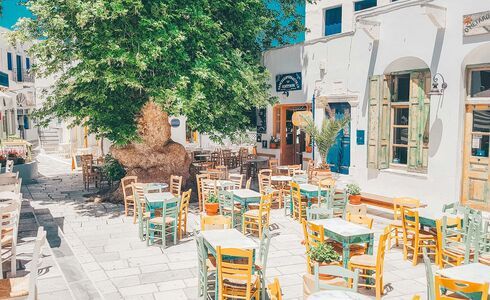 Pyrgos, in the north, has a charming square where you can settle down to Greek coffee and a slice of galaktoboureko