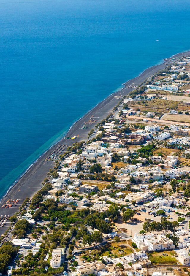 The awesome black-sand beaches of Santorini from above