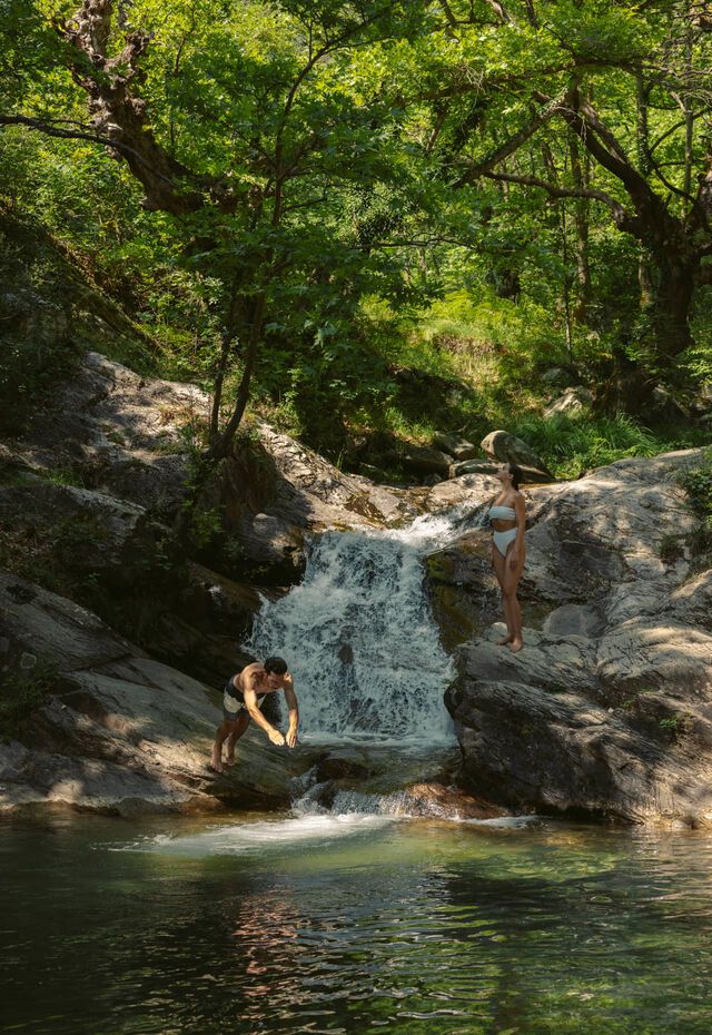 Swimming at a waterfall during a hike on Mt Pangaio