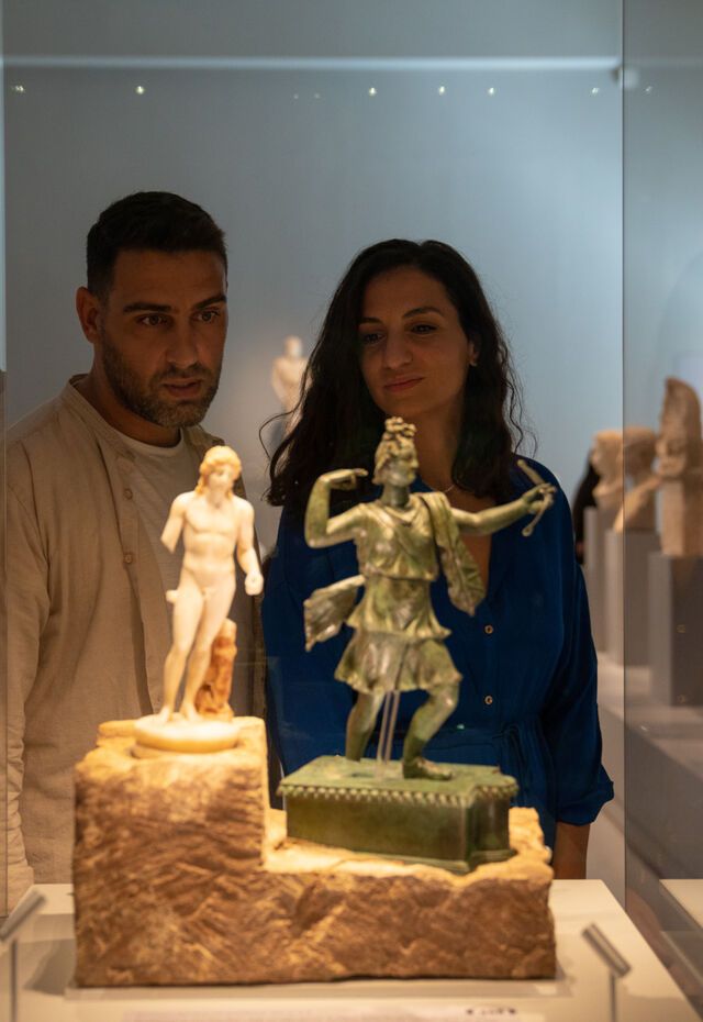 Admiring ancient sculptures and timeless artistry