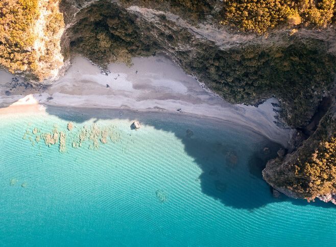 In central Evia you will find the most famous hiliadou with it's lush vegetation sand and pebbles of every shape and size